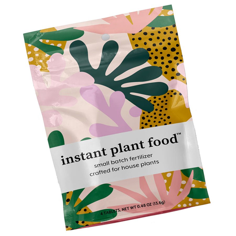 Instant Plant Food small batch houseplant fertilizer tablets in a colorful pouch.